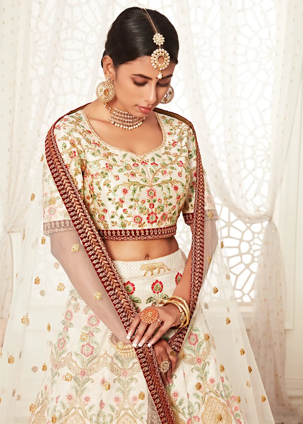 Trendy Off White Silk Embroidered Wedding Lehenga Choli